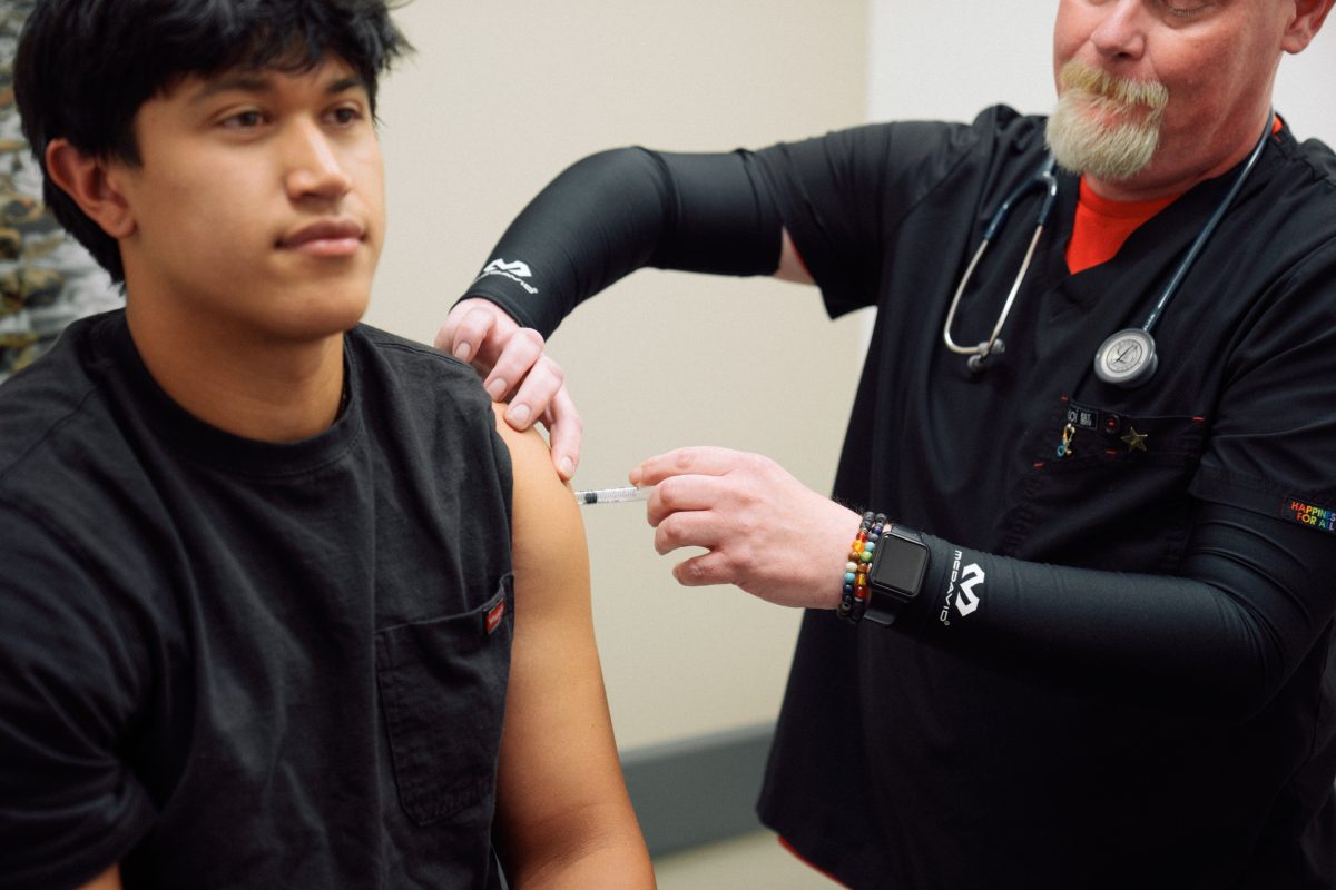 Patient receiving vaccine at AFC Urgent Care Fort Collins